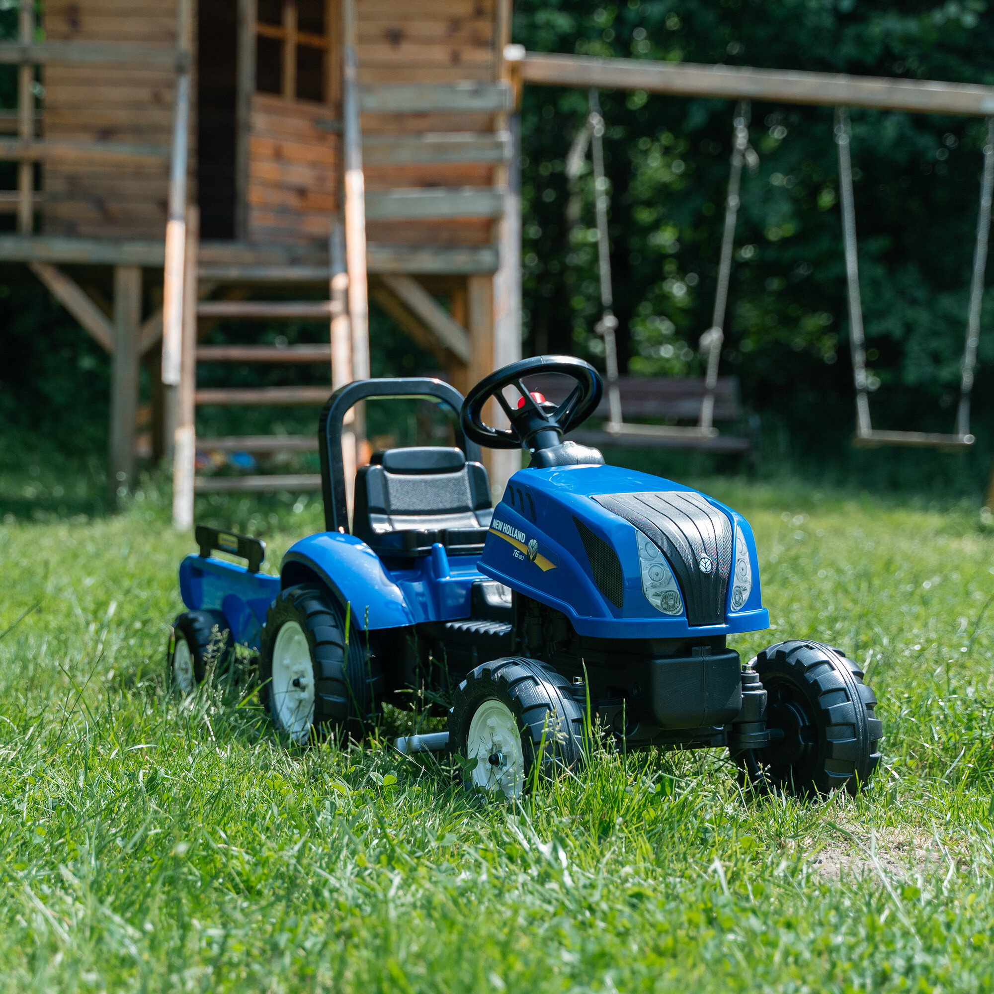 Traktor med vogn FALK New Holland